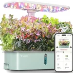 This image shows a sleek, modern countertop hydroponic system with vibrant green plants growing.