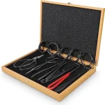 The image shows a complete bonsai tree training kit with essential tools for shaping and caring for miniature trees.