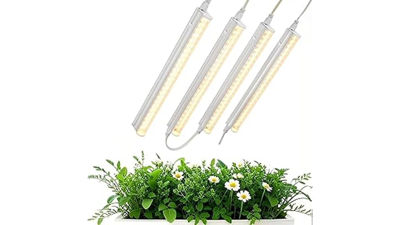 The image shows a high-quality LED grow light illuminating lush green plants in a hydroponic setup.