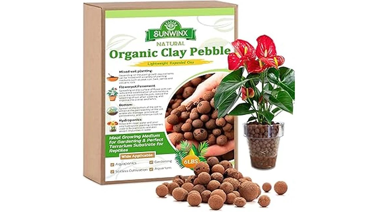 The image shows a close-up of a hydroponic grow bed filled with assorted clay pebbles for growing plants.