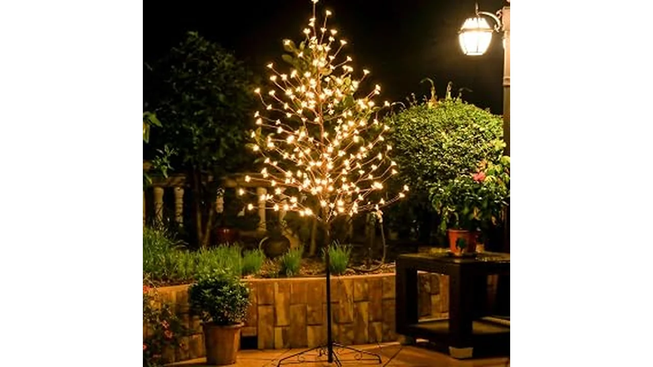 The image shows a beautifully lit artificial bonsai tree, a top-rated decorative option for your home.