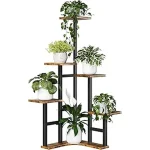 The image shows a stylish wooden plant stand holding several potted plants, ideal for home gardening.