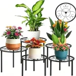 The image shows a modern plant stand holding a decorative flower pot, highlighting the best indoor plant stands for review.