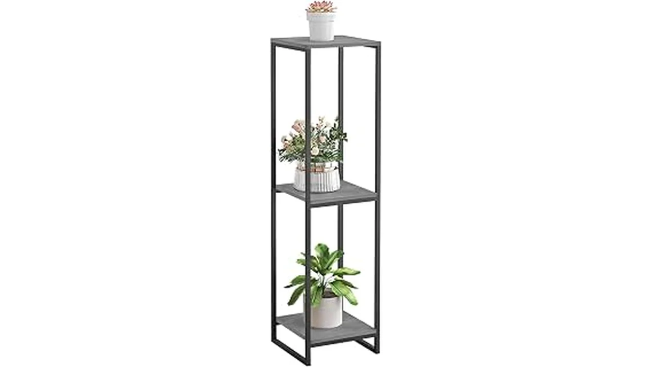 The image shows a stylish narrow indoor plant stand holding potted plants in a compact living space.