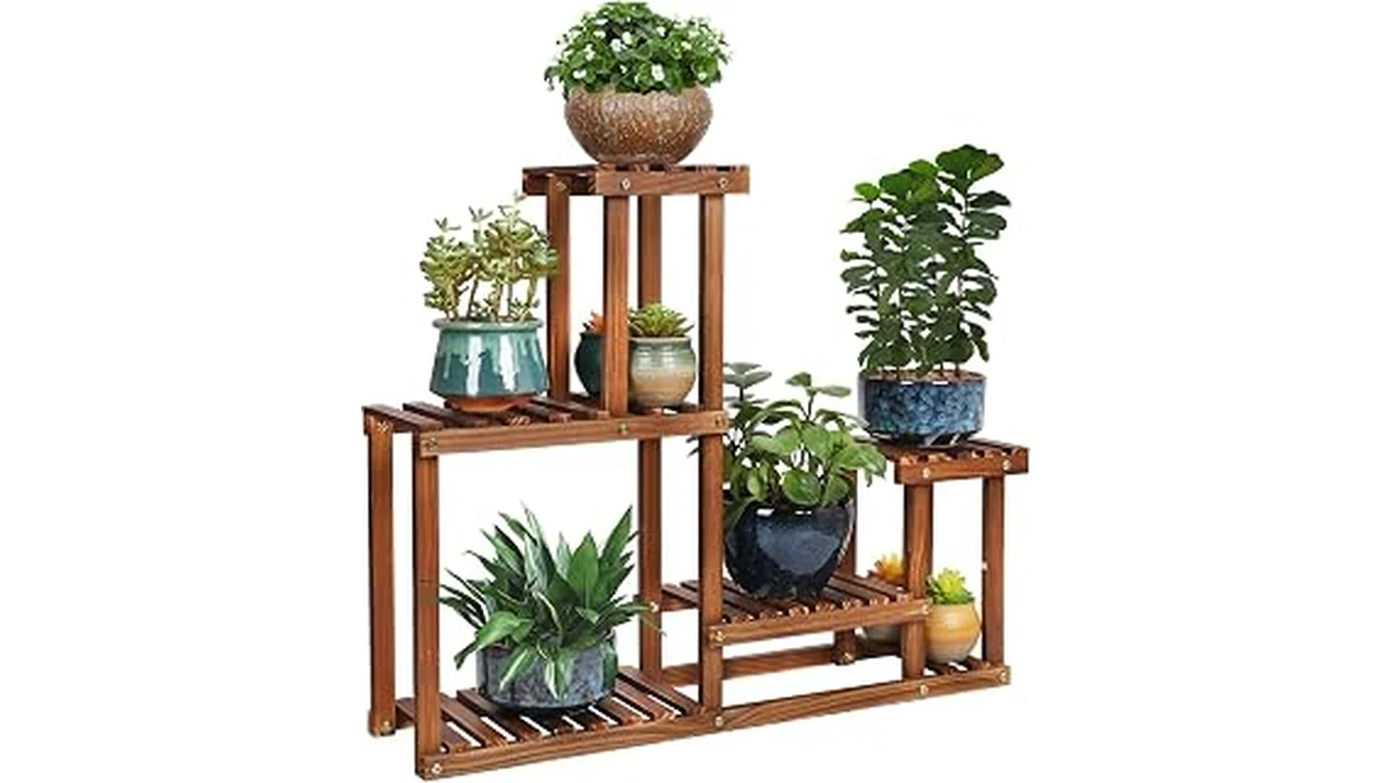 The image shows a beautifully crafted pine wood indoor plant stand, perfect for displaying houseplants.