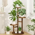 The image shows a collection of rustic wooden indoor plant stands, perfect for apartment living.